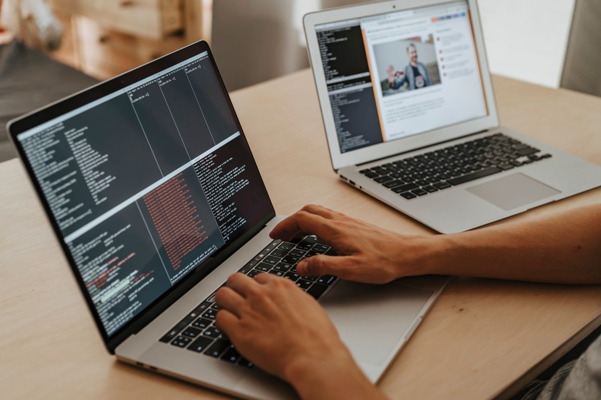 Laptop on a desk showing programming work for data pipeline development